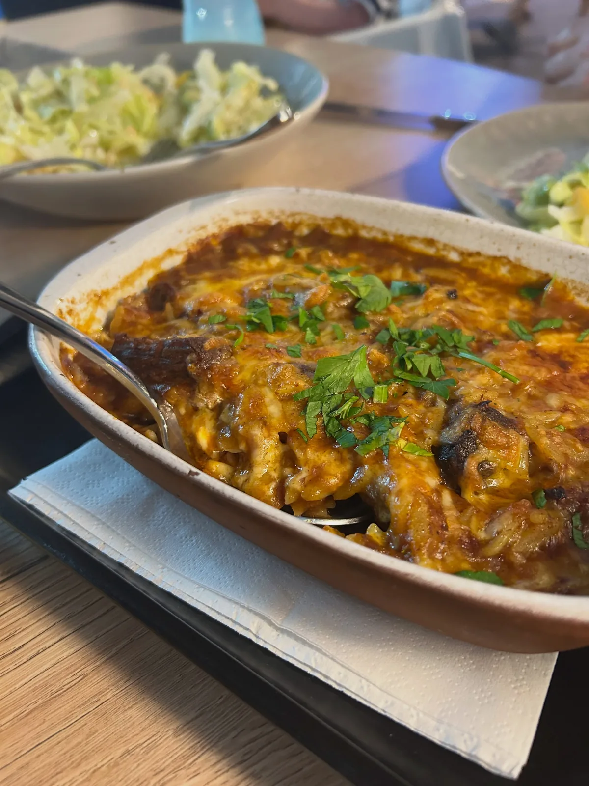Giouvetsi — slow-cooked beef with orzo in tomato sauce, baked in a clay dish